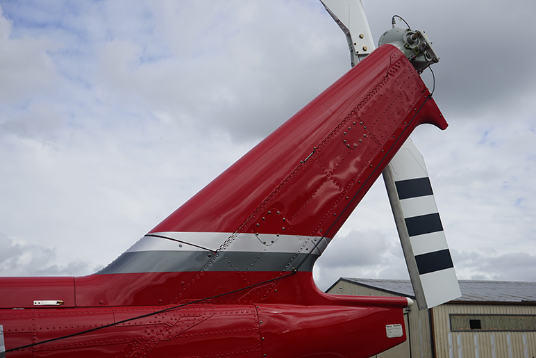 Vertical fin cover on bell helicopter sideview