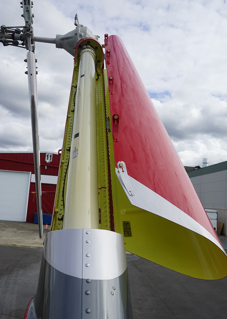 Vertical fin cover on bell helicopter with hinge open